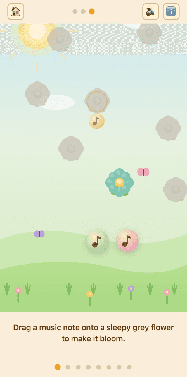 Game three: a music note dragged onto a sleepy grey flower makes it bloom into colour.